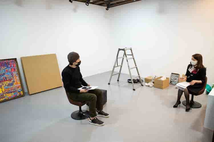 Aoyama in conversation with the author at his gallery